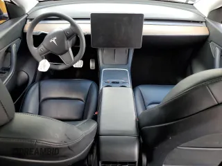 2021 Tesla Model Y Long Range with VIN 5YJYGDEEXMF188737, listed as a Copart auction lot 49117605 with 49,201 mi miles and Salvage Title. Bid and sale history available at DreamBid. Image 8.