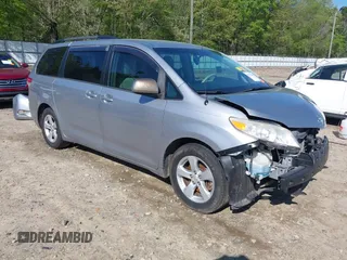 2014 Toyota Sienna LE AAS with VIN 5TDKK3DC4ES466642, listed as a IAAI auction lot 41978930 with 123,084 mi miles. Bid and sale history available at carsss.com. Image 1.