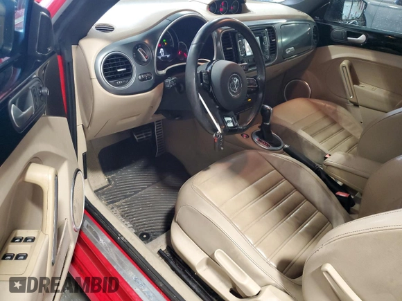 2015 Volkswagen Beetle with VIN 3VW7S7AT1FM822318, listed as a Copart auction lot 71398644 with 73,421 mi miles and Salvage Title. Bid and sale history available at DreamBid. Image 8.