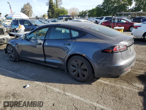 2023 Tesla Model S с VIN 5YJSA1E55PF522232, выставлен на аукционе Copart как лот 47735815 с пробегом Не указан миль и Списание • Salvage title. История ставок и продаж доступна на DreamBid. Изображение 2.