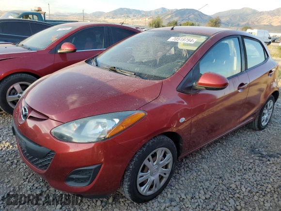 2014 Mazda 2 Sport with VIN JM1DE1KZ5E0186789, listed as a Copart auction lot 70519794 with 106,127 mi miles and Salvage Title. Bid and sale history available at carsss.com. Image 1.