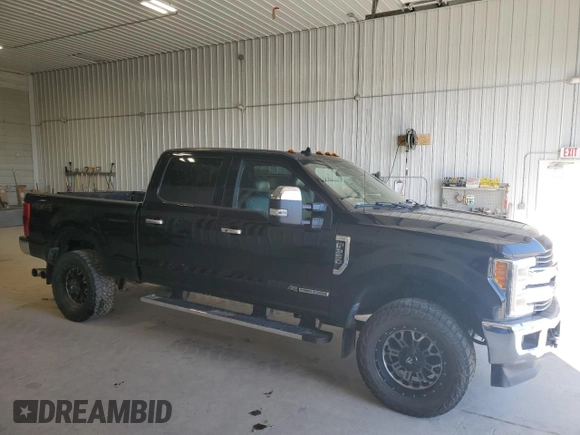 2019 Ford F-350 XL with VIN 1FT8W3BT2KEG36001, listed as a Copart auction lot 52803685 with 119,710 mi miles and Salvage Title. Bid and sale history available at DreamBid. Image 4.