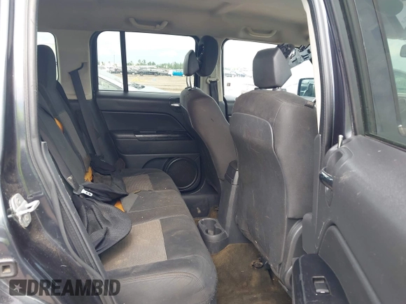 2014 Jeep Patriot Latitude with VIN 1C4NJPFA2ED564275, listed as a IAAI auction lot 42371032 with 221,965 mi miles and . Bid and sale history available at DreamBid. Image 8.