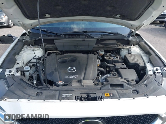 2018 Mazda CX-5 Grand Touring with VIN JM3KFBDM6J0451605, listed as a IAAI auction lot 42099182 with 81,703 mi miles and . Bid and sale history available at DreamBid. Image 10.