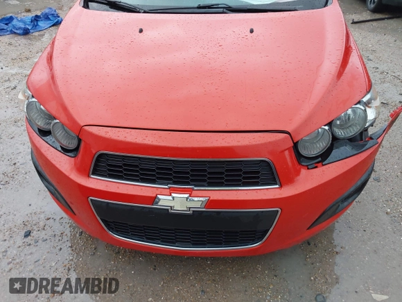 2013 Chevrolet Sonic LT with VIN 1G1JC6SHXD4139822, listed as a IAAI auction lot 41672289 with 87,899 mi miles. Bid and sale history available at carsss.com. Image 12.