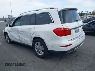 2014 Mercedes-Benz GL 450 z VIN 4JGDF7CE0EA424081, wystawiony jako IAAI lot #42359465 z przebiegiem 145 363 mil mil oraz . Historia ofert i sprzedaży dostępna na DreamBid. Obrazek 3.