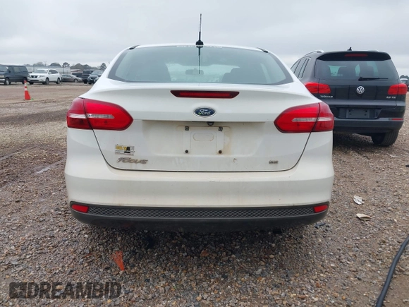 2018 Ford Focus SE z VIN 1FADP3F23JL225333, wystawiony jako IAAI lot #41758445 z przebiegiem 133 307 mil mil oraz . Historia ofert i sprzedaży dostępna na DreamBid. Obrazek 16.