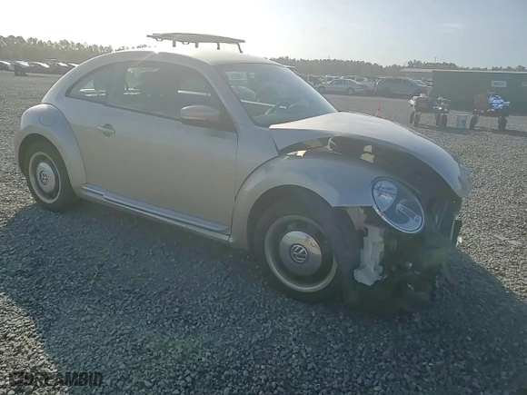 2013 Volkswagen Beetle Coupe 2.5L with VIN 3VWJX7AT7DM612696, listed as a Copart auction lot 78840244 with 128,499 mi miles and Salvage Title. Bid and sale history available at carsss.com. Image 11.