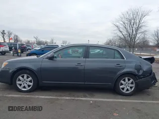 2009 Toyota Avalon XL with VIN 4T1BK36B59U350786, listed as a IAAI auction lot 41322151 with 222,128 mi miles and . Bid and sale history available at carsss.com. Image 14.