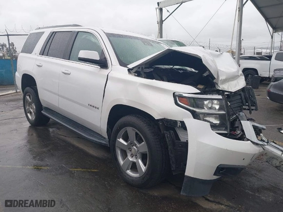 2018 Chevrolet Tahoe LT with VIN 1GNSKBKC7JR351112, listed as a IAAI auction lot 41732631 with 103,771 mi miles. Bid and sale history available at carsss.com. Image 1.