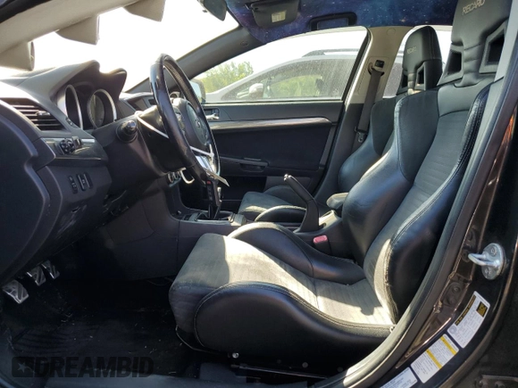 2008 Mitsubishi Lancer Evolution GSR with VIN JA3AW86V58U049914, listed as a Copart auction lot 62105824 with 129,622 mi miles and Salvage Title. Bid and sale history available at carsss.com. Image 7.