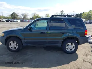 2003 Ford Escape XLT Popular 2 with VIN 1FMYU93113KB33578, listed as a IAAI auction lot 41985463 with 103,500 mi miles and . Bid and sale history available at DreamBid. Image 14.