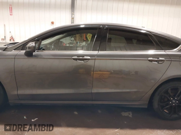 2019 Ford Fusion SE with VIN 3FA6P0HD9KR103813, listed as a IAAI auction lot 41471645 with 89,249 mi miles and . Bid and sale history available at carsss.com. Image 14.