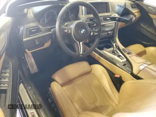 2015 BMW M6 z VIN WBSLZ9C54FD651463, wystawiony jako Copart lot #50922005 z przebiegiem Nie podano mil oraz Szkoda całkowita • Salvage title. Historia ofert i sprzedaży dostępna na DreamBid. Obrazek 8.