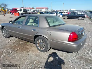 2006 Mercury Grand Marquis LS Premium with VIN 2MEFM75W46X654674, listed as a IAAI auction lot 42039177 with 157,171 mi miles. Bid and sale history available at carsss.com. Image 3.