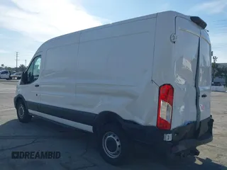 2023 Ford Transit Cargo with VIN 1FTBR1C85PKC08945, listed as a IAAI auction lot 41385685 with 5,577 mi miles and . Bid and sale history available at DreamBid. Image 3.