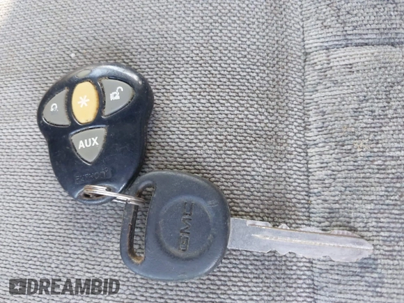 2005 GMC Envoy SLE z VIN 1GKDT13S852116252, wystawiony jako IAAI lot #42086929 z przebiegiem Nie podano mil oraz . Historia ofert i sprzedaży dostępna na DreamBid. Obrazek 11.