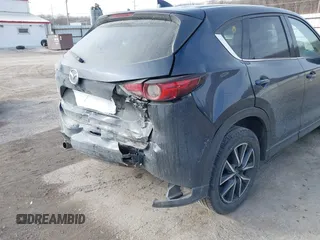 2018 Mazda CX-5 Grand Touring with VIN JM3KFBDM7J0338665, listed as a IAAI auction lot 41546019 with 141,740 mi miles. Bid and sale history available at carsss.com. Image 6.