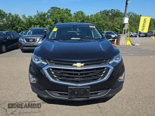 2020 Chevrolet Equinox LT with VIN 2GNAXJEVXL6233574, listed as a IAAI auction lot 42573162 with 58,591 mi miles and . Bid and sale history available at DreamBid. Image 3.