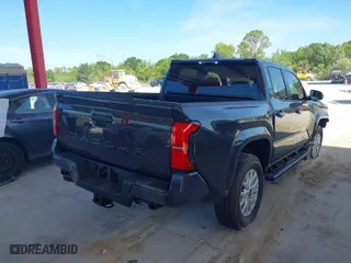 2024 Toyota Tacoma 2WD SR5 with VIN 3TMKB5FN9RM020325, listed as a IAAI auction lot 41891857 with 1,209 mi miles. Bid and sale history available at carsss.com. Image 4.