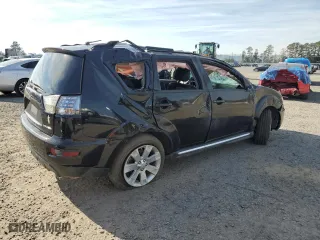 2010 Mitsubishi Outlander SE with VIN JA4AS3AW1AZ014063, listed as a Copart auction lot 79934964 with 140,404 mi miles and Salvage Title. Bid and sale history available at carsss.com. Image 3.