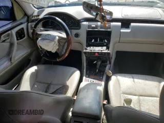 2001 Mercedes-Benz E-Class AWD with VIN WDBJF82J21X056553, listed as a Copart auction lot 73046694 with 0 mi miles and Salvage Title. Bid and sale history available at carsss.com. Image 8.