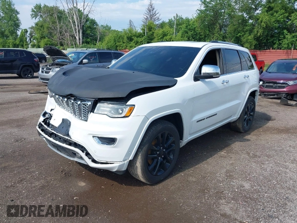2017 Jeep Grand Cherokee Overland with VIN 1C4RJFCT6HC880306, listed as a IAAI auction lot 42534987 with 97,976 mi miles and . Bid and sale history available at DreamBid. Image 17.