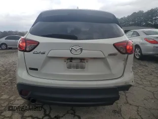 2015 Mazda CX-5 Grand Touring with VIN JM3KE2DY6F0504784, listed as a Copart auction lot 47671705 with 174,682 mi miles and Salvage Title. Bid and sale history available at carsss.com. Image 6.