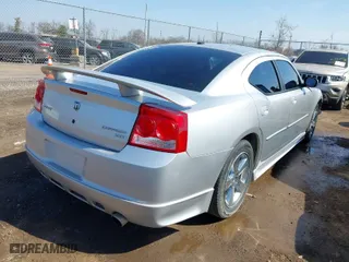 2010 Dodge Charger SXT with VIN 2B3CA3CV9AH177924, listed as a IAAI auction lot 41787570 with 174,906 mi miles. Bid and sale history available at carsss.com. Image 4.