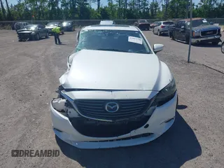 2016 Mazda Mazda6 i Grand Touring with VIN JM1GJ1W55G1443186, listed as a IAAI auction lot 42063716 with 114,263 mi miles. Bid and sale history available at carsss.com. Image 12.