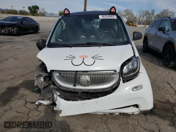 2016 Smart fortwo Passion z VIN WMEFJ5DA4GK141225, wystawiony jako Copart lot #48356965 z przebiegiem 65 928 mil mil oraz Szkody całkowita. Historia ofert i sprzedaży dostępna na DreamBid. Obrazek 5.
