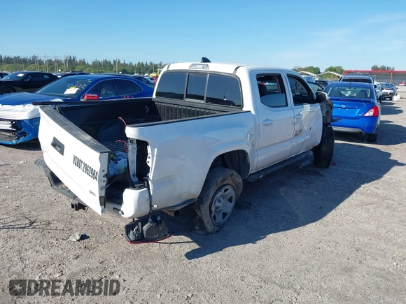 2023 Toyota Tacoma SR with VIN 3TMCZ5AN2PM649123, listed as a IAAI auction lot 41687819 with 44,383 mi miles and . Bid and sale history available at DreamBid. Image 4.