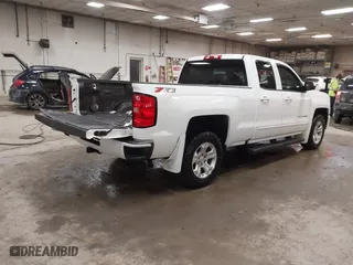 2018 Chevrolet Silverado 1500 LT with VIN 1GCVKREC6JZ239038, listed as a IAAI auction lot 41391604 with 134,129 mi miles. Bid and sale history available at carsss.com. Image 4.