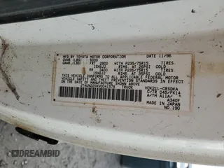 1997 Toyota T100 DX z VIN JT4UN22DXV0041578, wystawiony jako Copart lot #77388104 z przebiegiem 333 587 mil mil oraz Tytuł czysty. Historia ofert i sprzedaży dostępna na DreamBid. Obrazek 12.