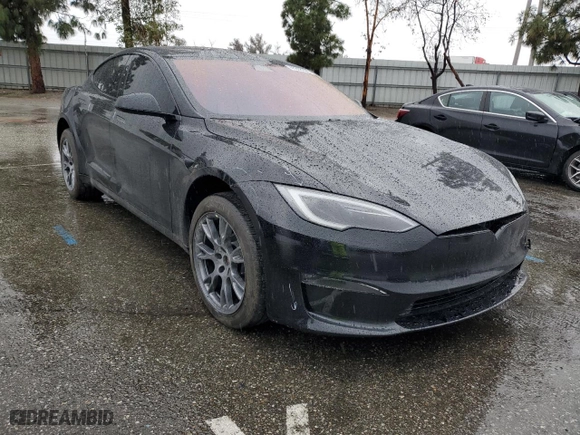 2023 Tesla Model S with VIN 5YJSA1E59PF514540, listed as a Copart auction lot 45308895 with 24,165 mi miles and Salvage Title. Bid and sale history available at carsss.com. Image 4.