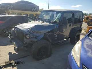 2002 Jeep Wrangler Sport with VIN 1J4FA49S72P715946, listed as a Copart auction lot 70884114 with 114,964 mi miles and Clean Title. Bid and sale history available at carsss.com. Image 1.