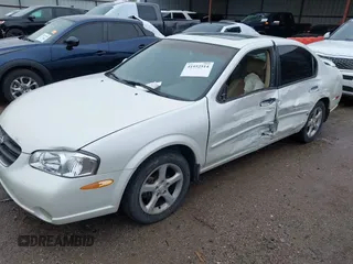 2000 Nissan Maxima GXE z VIN JN1CA31A4YT206065, wystawiony jako IAAI lot #41952514 z przebiegiem 2 953 347 mil mil oraz . Historia ofert i sprzedaży dostępna na DreamBid. Obrazek 2.