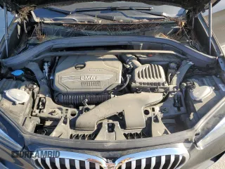 2021 BMW X1 sDrive28i z VIN WBXJG7C02M5U22447, wystawiony jako Copart lot #52927285 z przebiegiem 45 128 mil mil oraz Szkody całkowita. Historia ofert i sprzedaży dostępna na DreamBid. Obrazek 11.