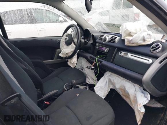 2012 Smart fortwo Pure z VIN WMEEJ3BA9CK521416, wystawiony jako IAAI lot #41847989 z przebiegiem Nie podano mil oraz . Historia ofert i sprzedaży dostępna na DreamBid. Obrazek 5.