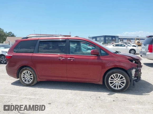 2016 Toyota Sienna XLE with VIN 5TDYK3DC7GS716470, listed as a IAAI auction lot 42177176 with 121,165 mi miles and . Bid and sale history available at DreamBid. Image 14.