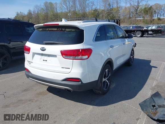 2016 Kia Sorento EX with VIN 5XYPHDA19GG133334, listed as a IAAI auction lot 41931741 with 138,051 mi miles and . Bid and sale history available at DreamBid. Image 4.
