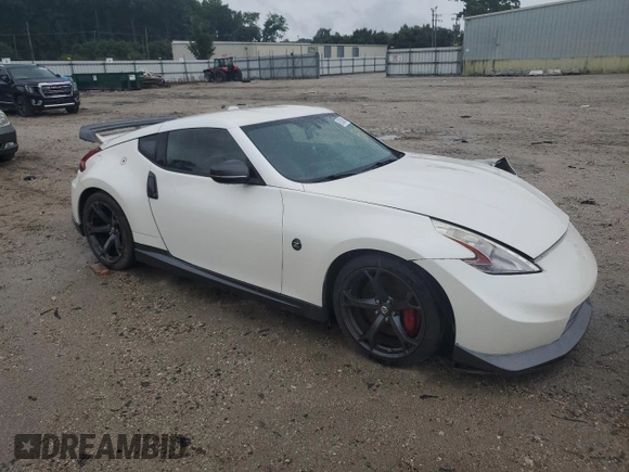 2014 Nissan 370Z with VIN JN1AZ4EH2EM633845, listed as a Copart auction lot 63583194 with 0 mi miles and Salvage Title. Bid and sale history available at carsss.com. Image 4.