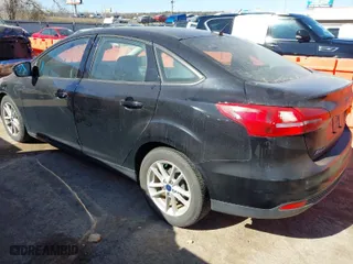 2018 Ford Focus SE with VIN 1FADP3F21JL259271, listed as a IAAI auction lot 41689494 with 94,190 mi miles. Bid and sale history available at carsss.com. Image 3.