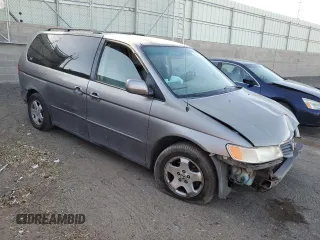 2000 Honda Odyssey EX with VIN 2HKRL1861YH527864, listed as a Copart auction lot 51343745 with 262,483 mi miles and Salvage Title. Bid and sale history available at DreamBid. Image 4.