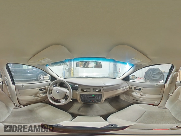 2007 Ford Taurus SE with VIN 1FAFP53U17A150484, listed as a Copart auction lot 56642465 with Not provided miles and Clean title. Bid and sale history available at DreamBid. Image 14.
