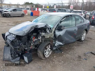 2014 Volkswagen Jetta SE z VIN 3VWD17AJ9EM358777, wystawiony jako IAAI lot #41880077 z przebiegiem 161 985 mil mil oraz . Historia ofert i sprzedaży dostępna na DreamBid. Obrazek 18.