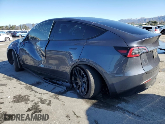 2023 Tesla Model Y Long Range with VIN 7SAYGDEE2PA047794, listed as a Copart auction lot 48397305 with 18,850 mi miles and Salvage Title. Bid and sale history available at DreamBid. Image 2.