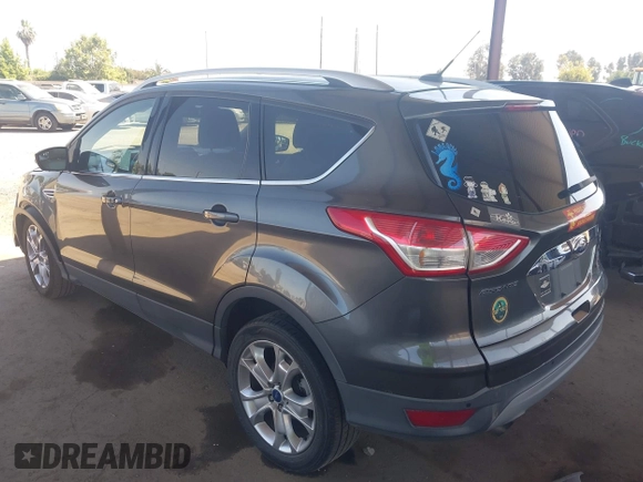 2015 Ford Escape Titanium with VIN 1FMCU0J92FUA20469, listed as a IAAI auction lot 42510293 with 161,466 mi miles and . Bid and sale history available at DreamBid. Image 3.