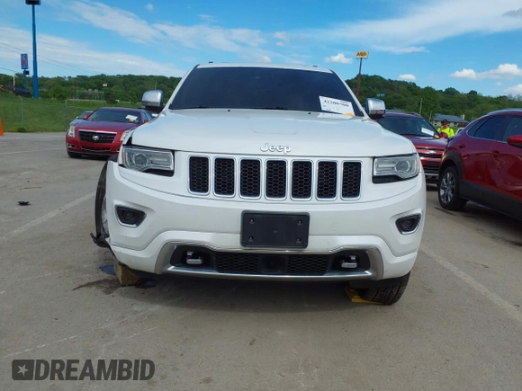 2016 Jeep Grand Cherokee Overland with VIN 1C4RJFCG2GC490420, listed as a IAAI auction lot 42200700 with 97,007 mi miles and . Bid and sale history available at DreamBid. Image 12.