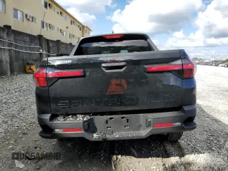 2023 Hyundai Santa Cruz SEL z VIN 5NTJB4AE4PH057705, wystawiony jako Copart lot #80667054 z przebiegiem 14 580 mil mil oraz Nie do naprawy • Non repairable. Historia ofert i sprzedaży dostępna na DreamBid. Obrazek 6.